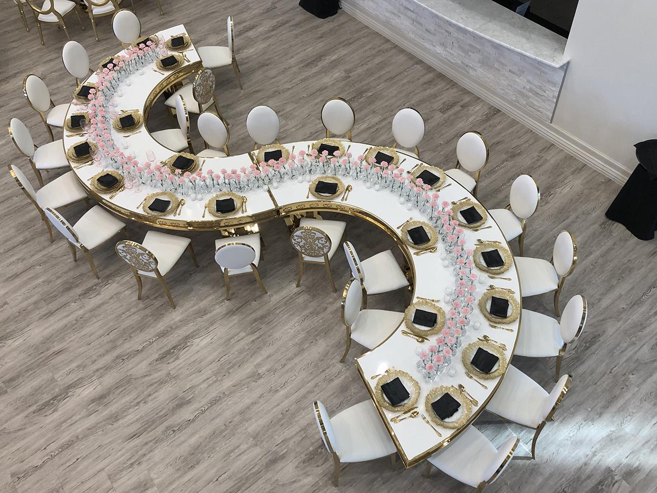 Knotting Hill Place in Dallas, Texas by Royal Luxury Events. Featuring our black and gold chairs, serpentine table, gold crystal tables, white and gold chairs, backdrops and more.