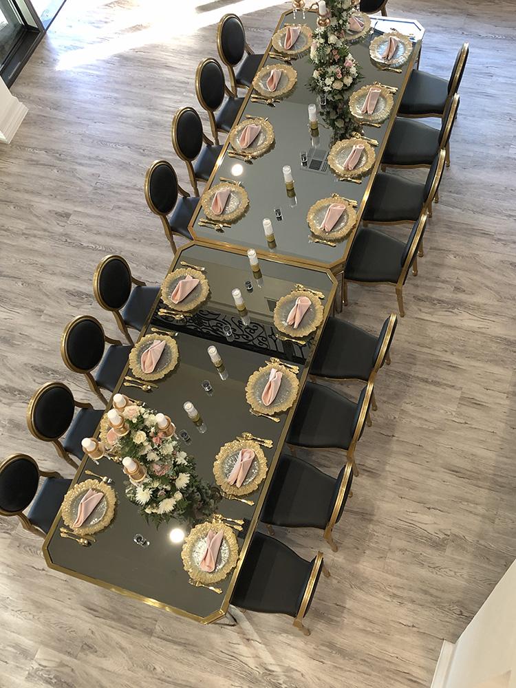Knotting Hill Place in Dallas, Texas by Royal Luxury Events. Featuring our black and gold chairs, serpentine table, gold crystal tables, white and gold chairs, backdrops and more.