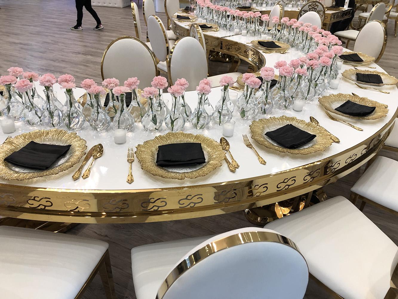Knotting Hill Place in Dallas, Texas by Royal Luxury Events. Featuring our black and gold chairs, serpentine table, gold crystal tables, white and gold chairs, backdrops and more.