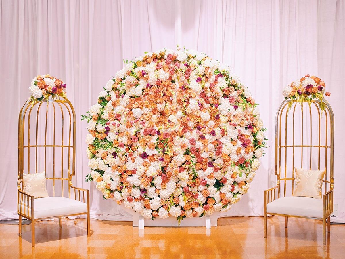 luxury wedding decor for weddings in houston at julia ideson library - gold chairs - long tables - clear vases