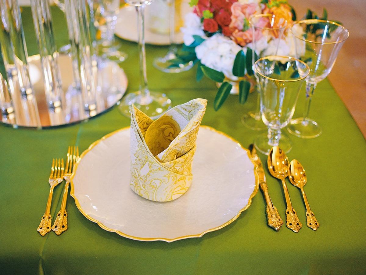 luxury wedding decor for weddings in houston at julia ideson library - gold chairs - long tables - clear vases