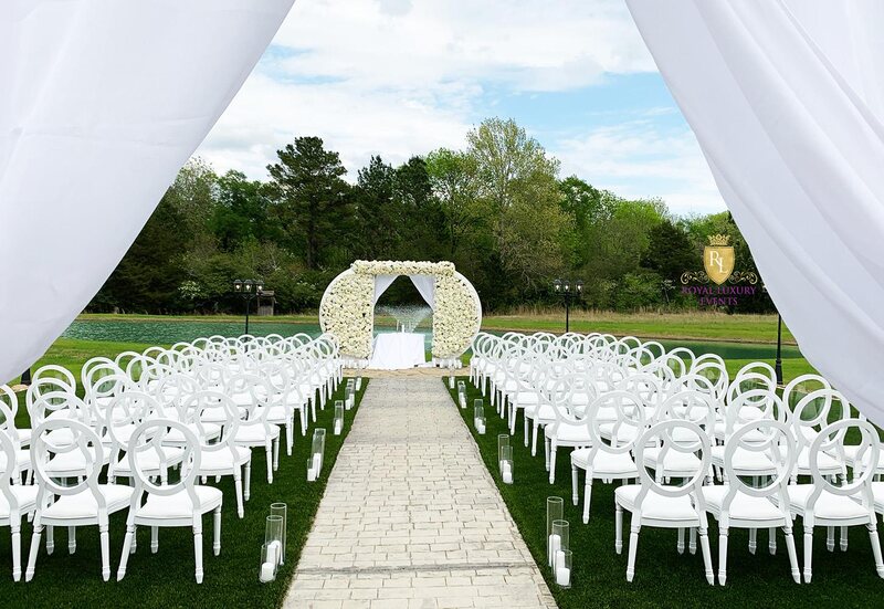 View this glamorous white wedding ceremony and reception at Venue 311 in Plantersville, Texas by Royal Luxury Events.