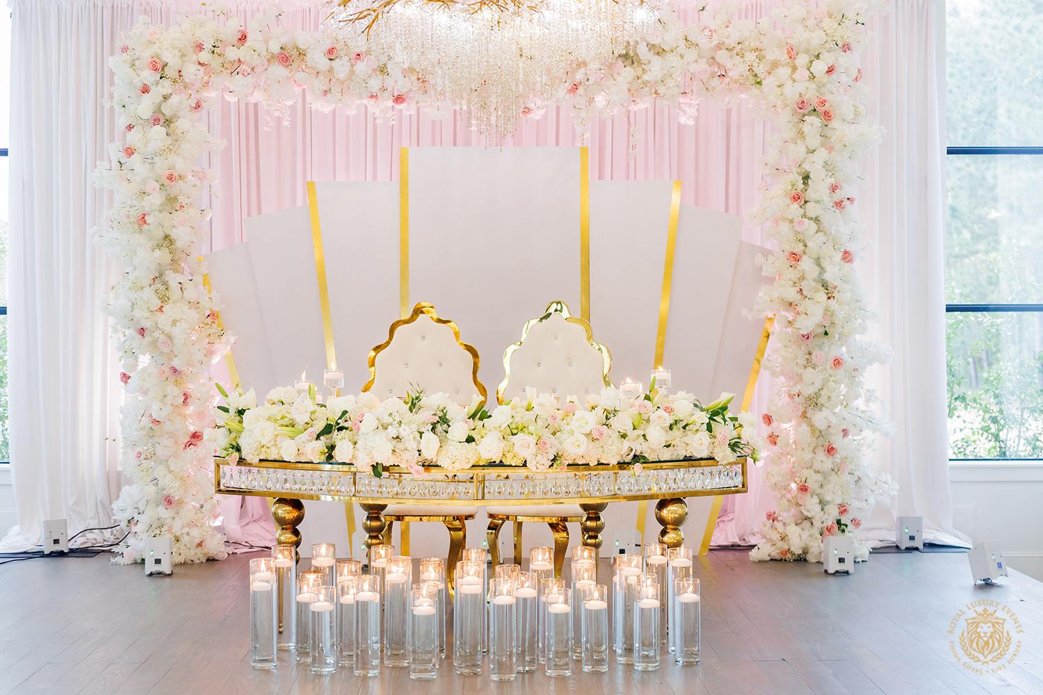 sweetheart table - floral arch - wedding backdrop - wedding stage