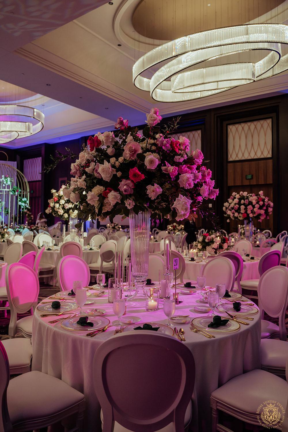 floral designer in houston - ivory flowers - pink flowers - tall floral centerpieces - low floral centerpieces - wedding centerpieces - white chair rentals