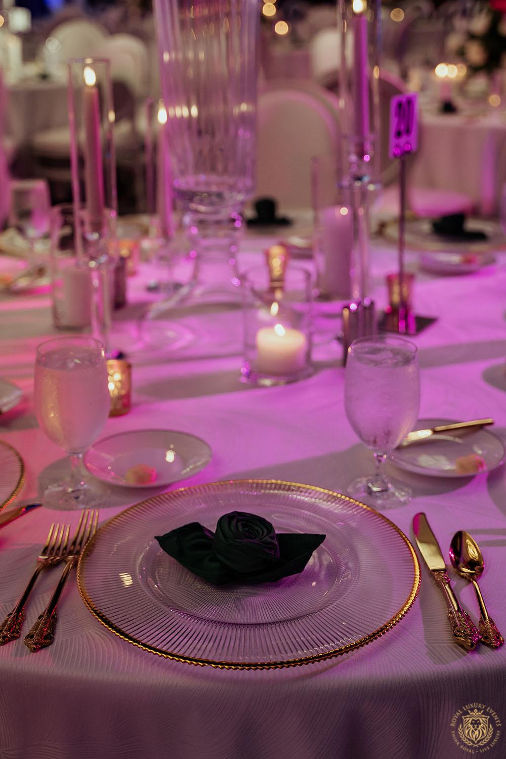 glass charger rentals - houston wedding rentals - gold flatware - emerald linens