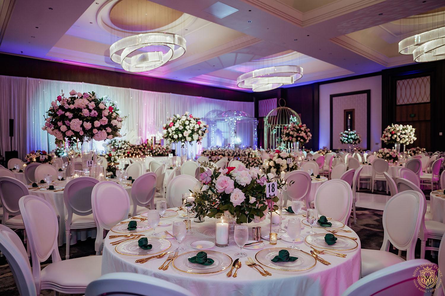 floral designer in houston - ivory flowers - pink flowers - tall floral centerpieces - low floral centerpieces - wedding centerpieces - white chair rentals