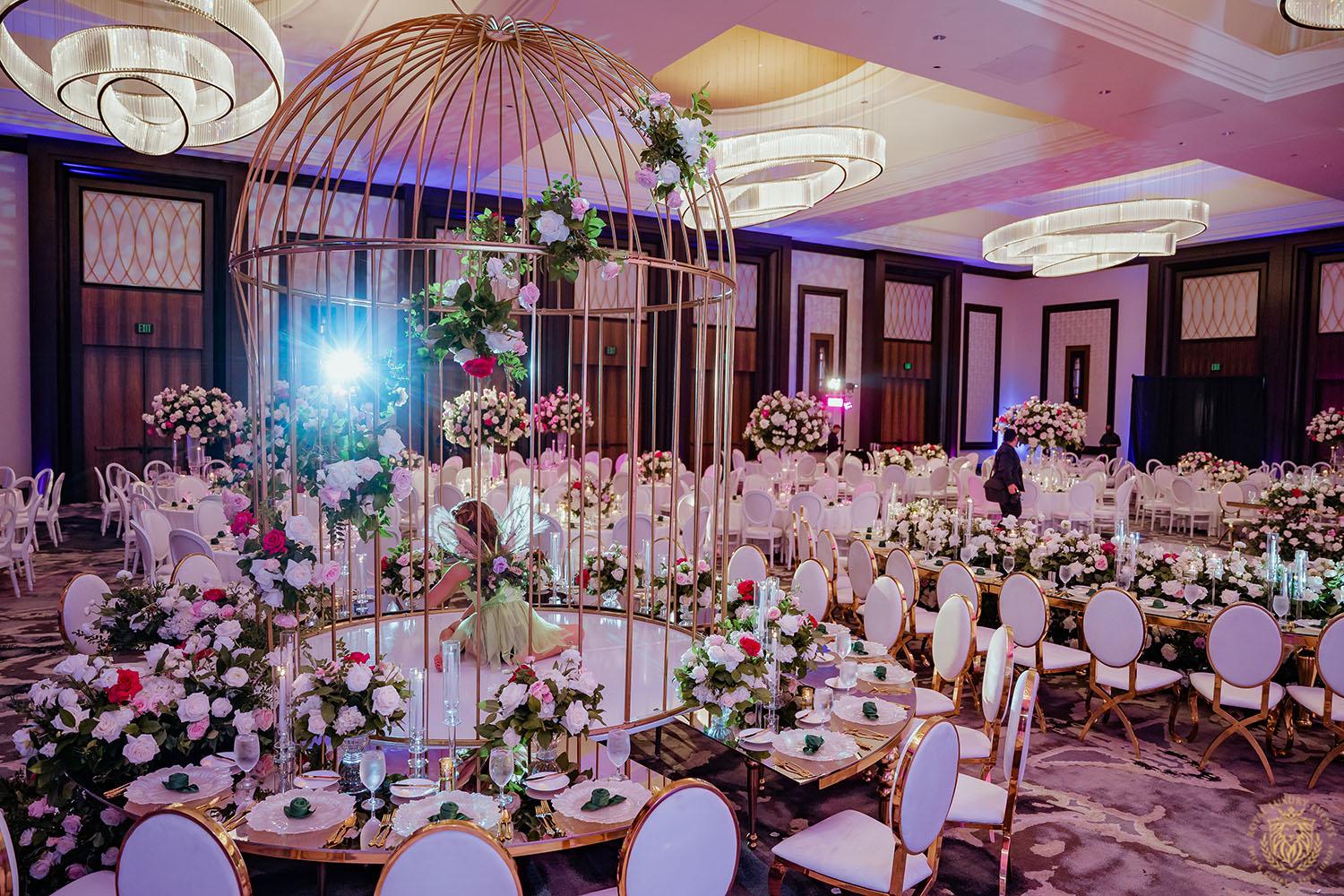 unique large wedding reception table centerpiece - white and gold chair rentals - wedding performers