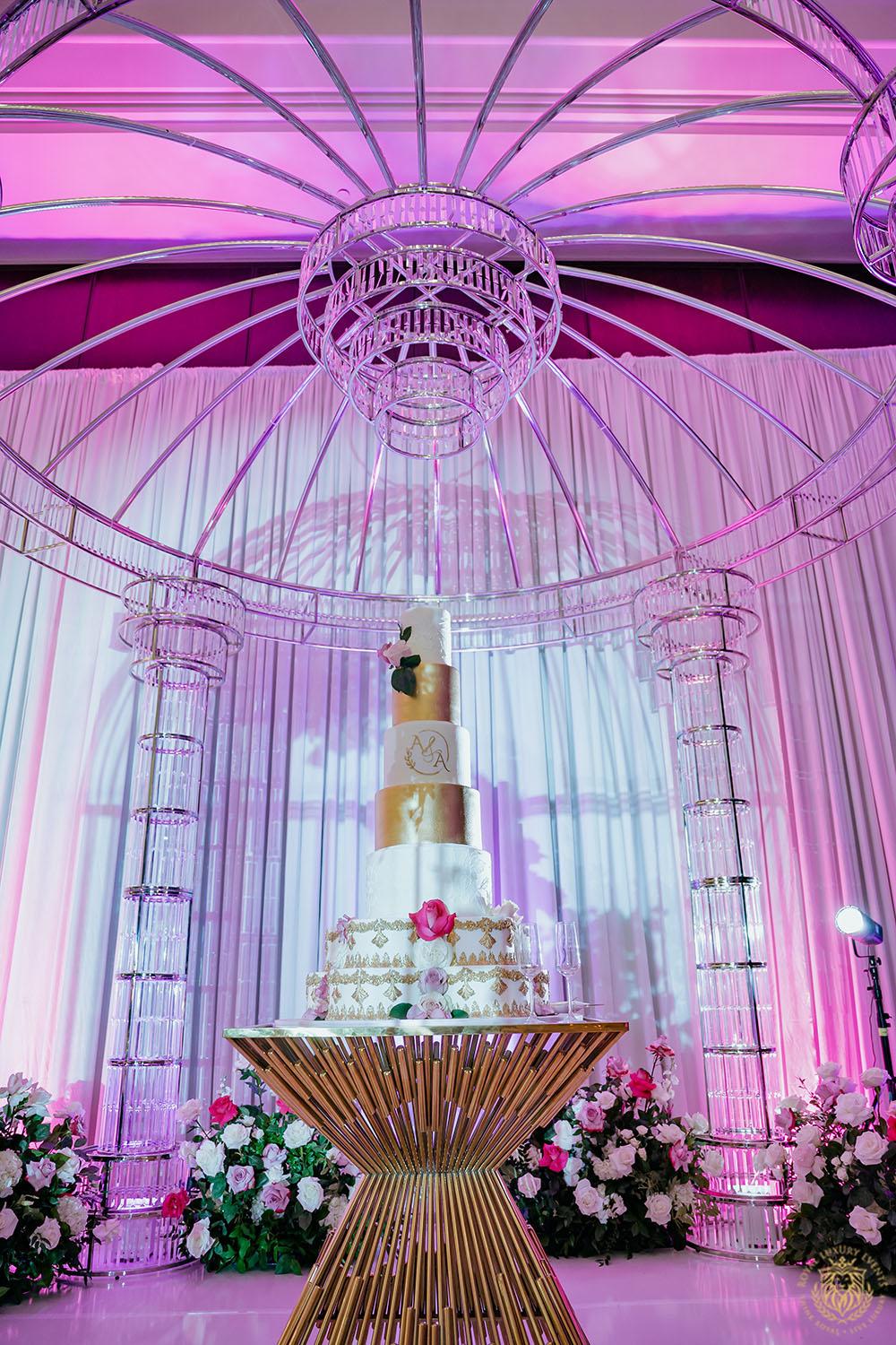 gold wedding cake table - acrylic canopy - luxury wedding cake display - event background draping