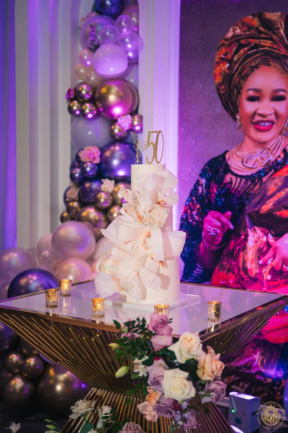 gold chair rentals - gold cake table - cake table display - backdrop draping - upscale birthday decor - post oak hotel