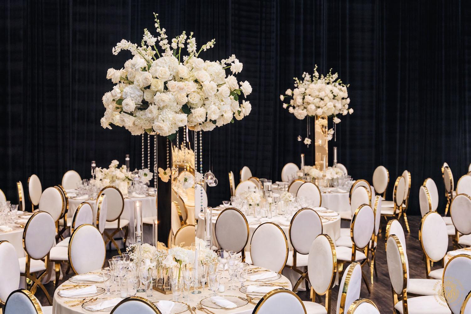 tall floral centerpieces, gold mirrored flower stand, white wedding flowers