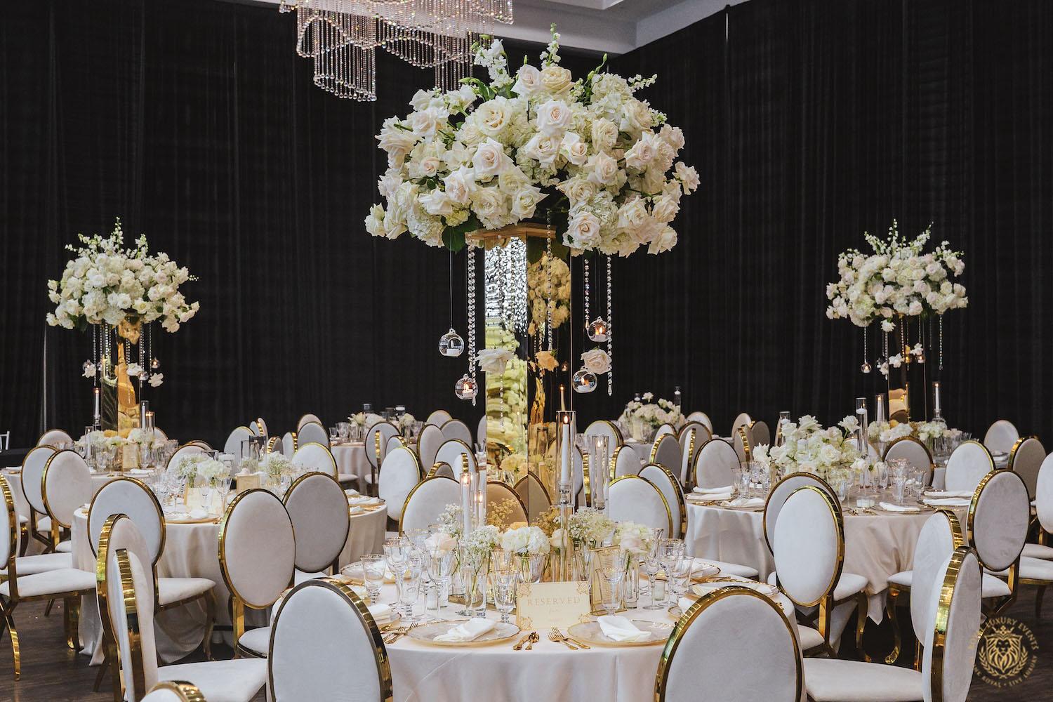 tall floral centerpieces, gold mirrored flower stand, white wedding flowers