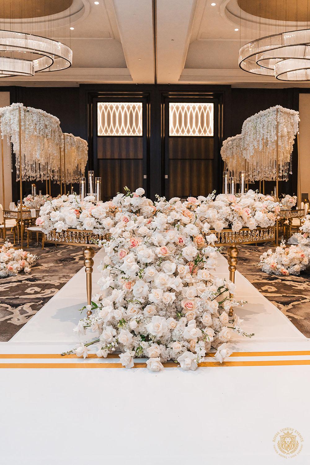 sweetheart table, sweetheart table decor, sweetheart table flowers, floral runner, gold chargers, wedding place setting, gold wedding table, wedding ideas, luxury wedding