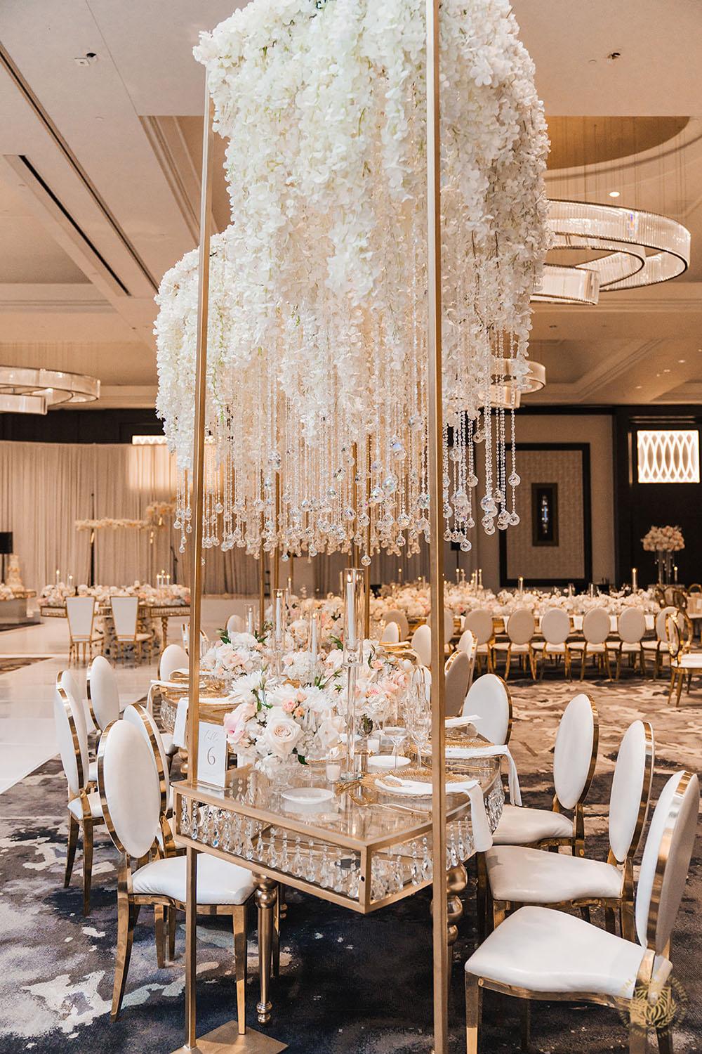 serpentine crystal table, unique wedding centerpieces, wedding reception decor, wedding chairs, white and gold chair rentals