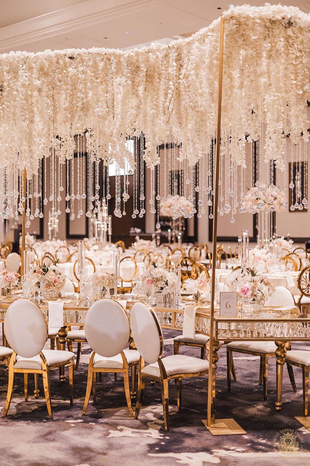 serpentine crystal table, unique wedding centerpieces, wedding reception decor, wedding chairs, white and gold chair rentals