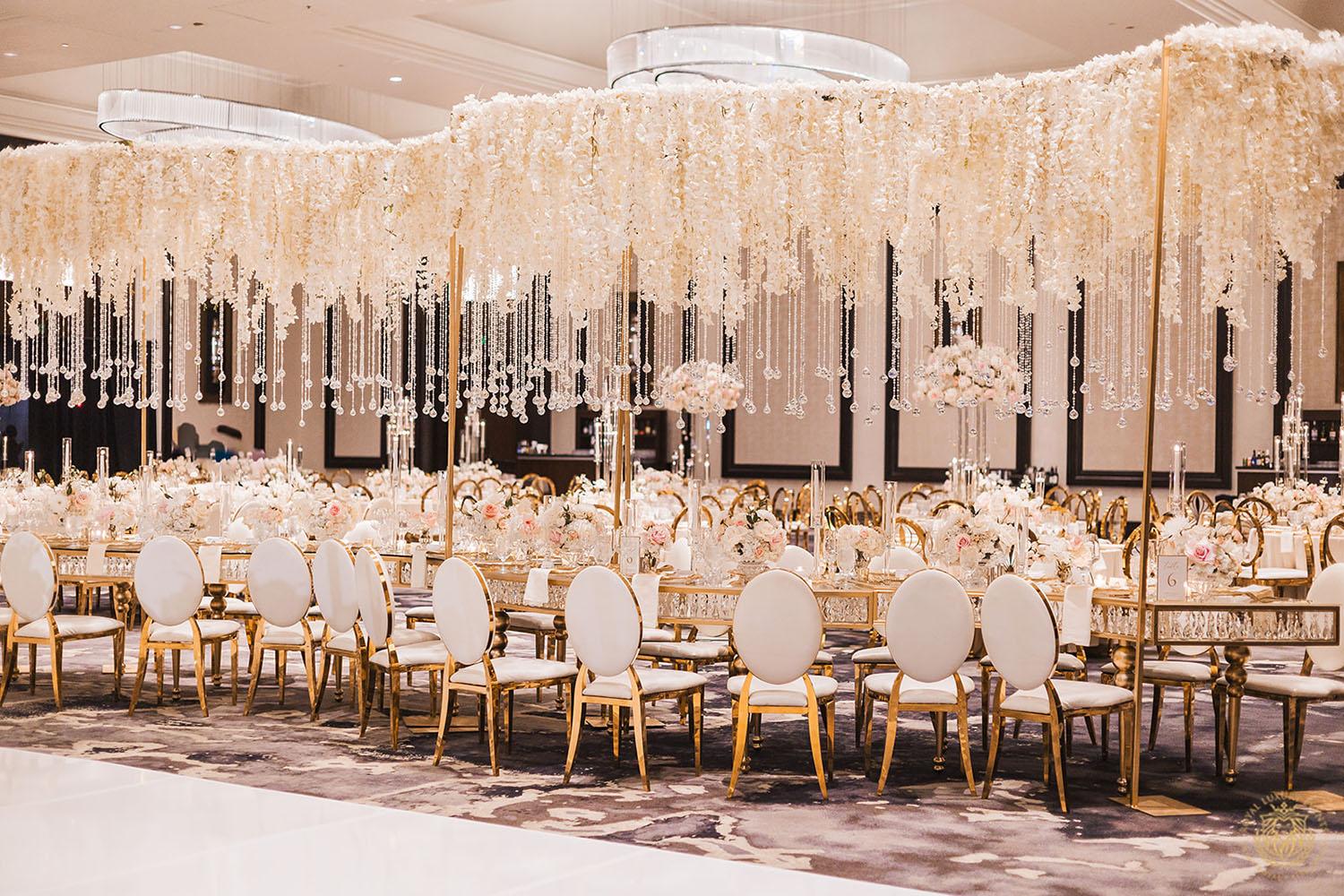 serpentine crystal table, unique wedding centerpieces, wedding reception decor, wedding chairs, white and gold chair rentals