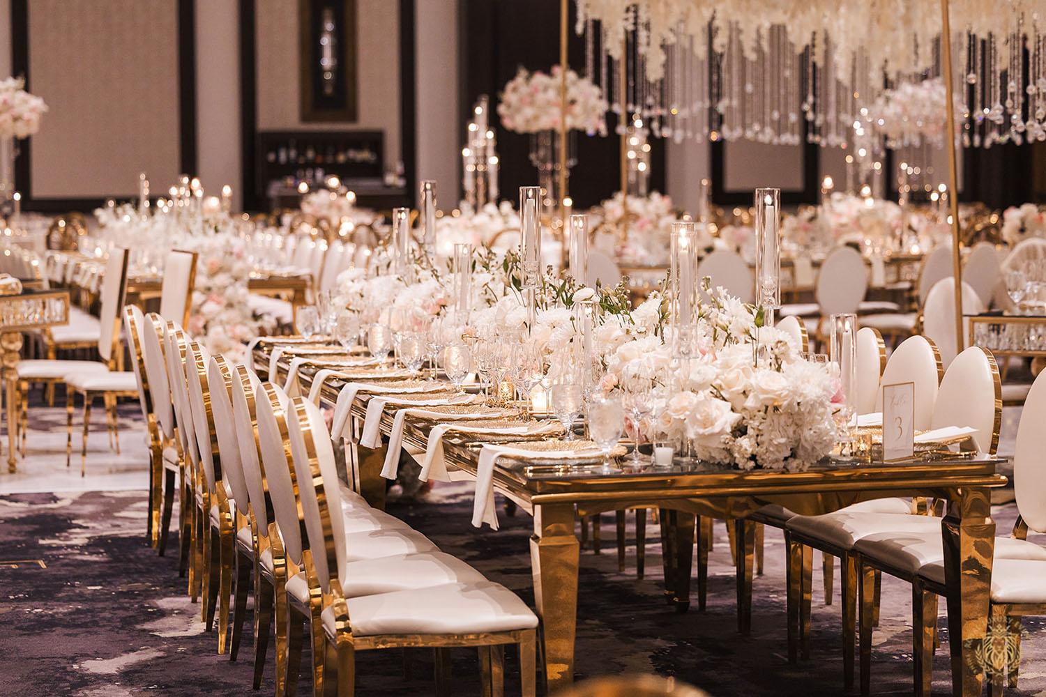 gold rectangle table, floral runner, wedding floral centerpieces, gold and white chair rentals, luxury wedding, wedding decor, wedding reception