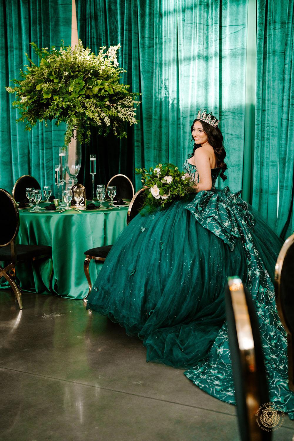 quinceañera decor, quinceañera theme, quinceañera ideas, luxury events, event designer, emerald, black, gold, greenery, florist, floral design, tall greenery centerpieces, draping backdrop