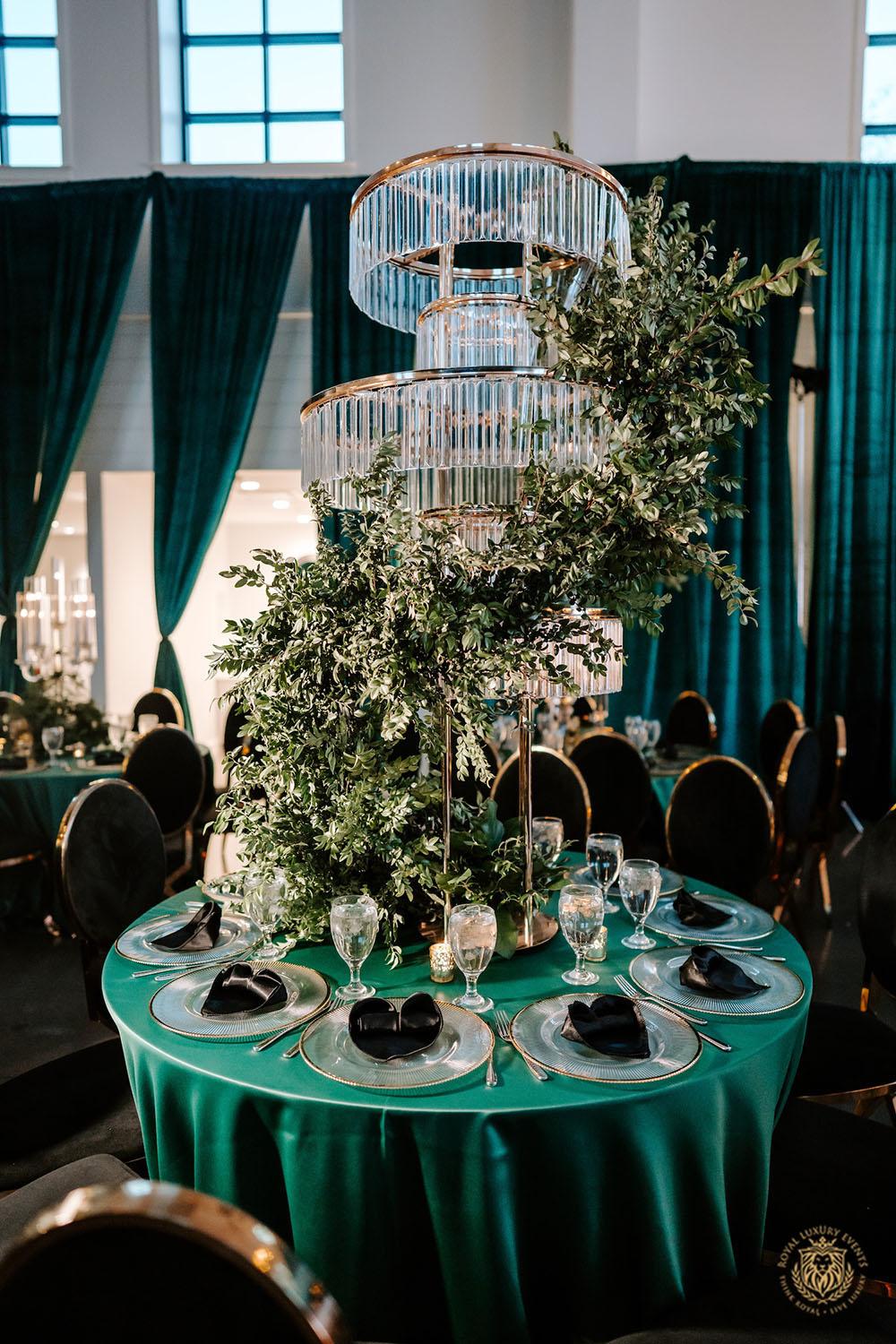 quinceañera, houston events, quinceañera theme, quinceañera ideas, luxury events, event designer, emerald, black, gold, greenery, florist, floral design, tall centerpieces, black and gold chairs, luxury chair rentals, emerald decor, draping backdrop