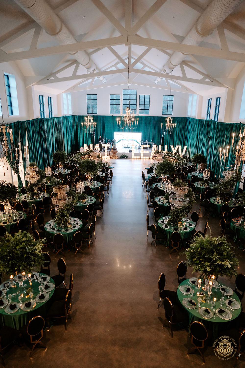 quinceañera, houston events, quinceañera theme, quinceañera ideas, luxury events, event designer, emerald, black, gold, greenery, florist, floral design, tall centerpieces, black and gold chairs, luxury chair rentals, emerald decor, draping backdrop