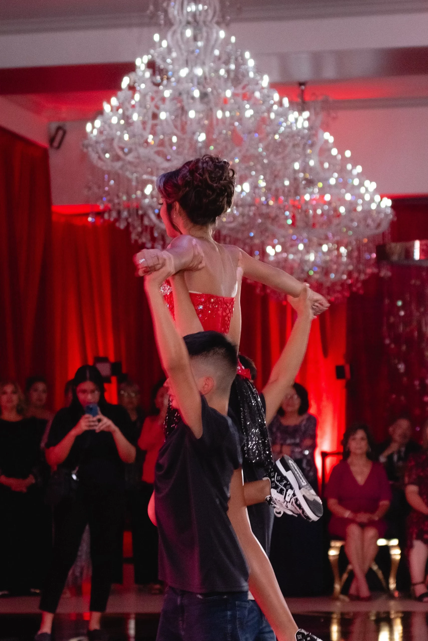 Victoria’s Quinceañera: Bold Red, Black & Gold Elegance