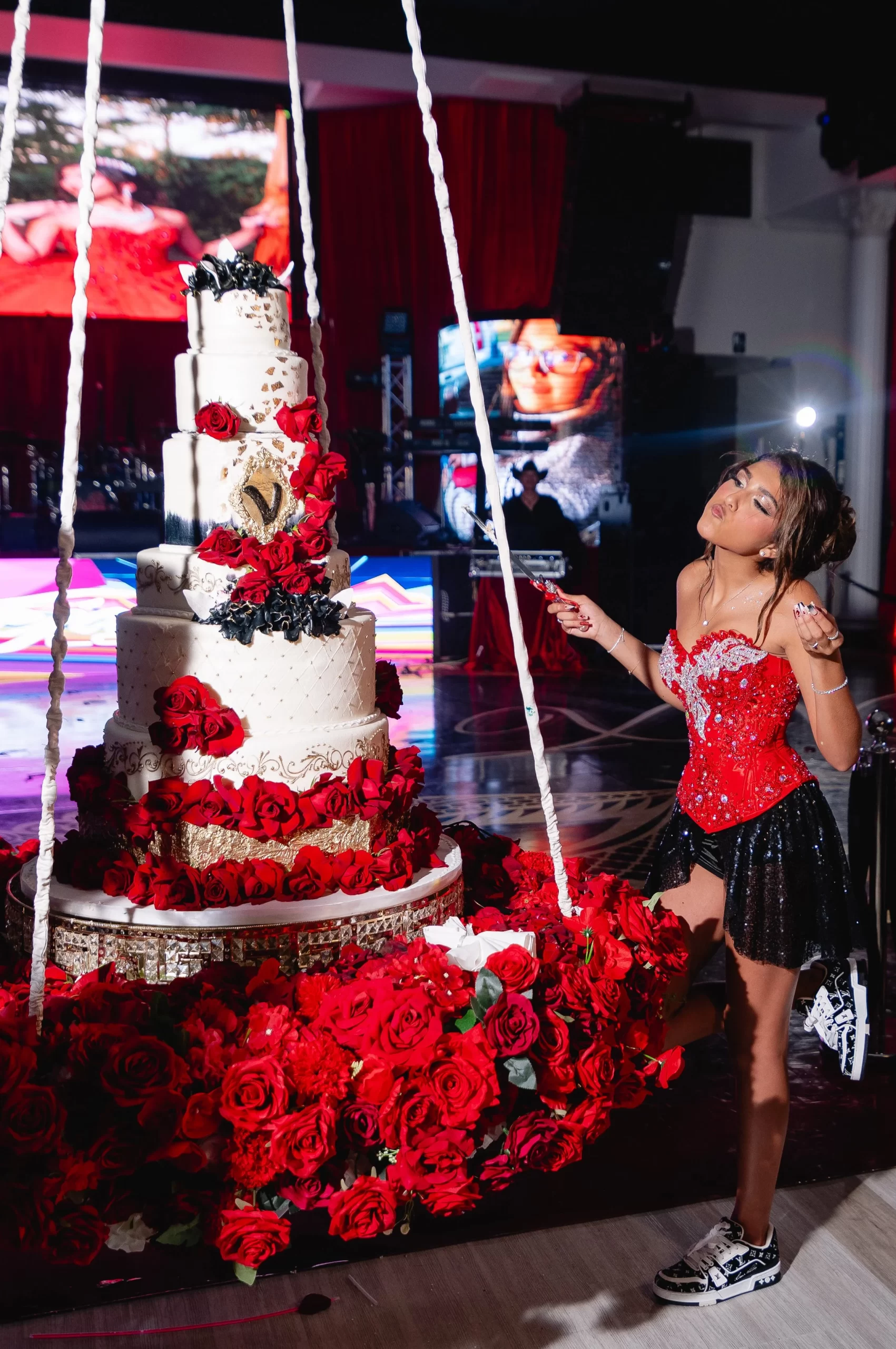 Victoria’s Quinceañera: Bold Red, Black & Gold Elegance