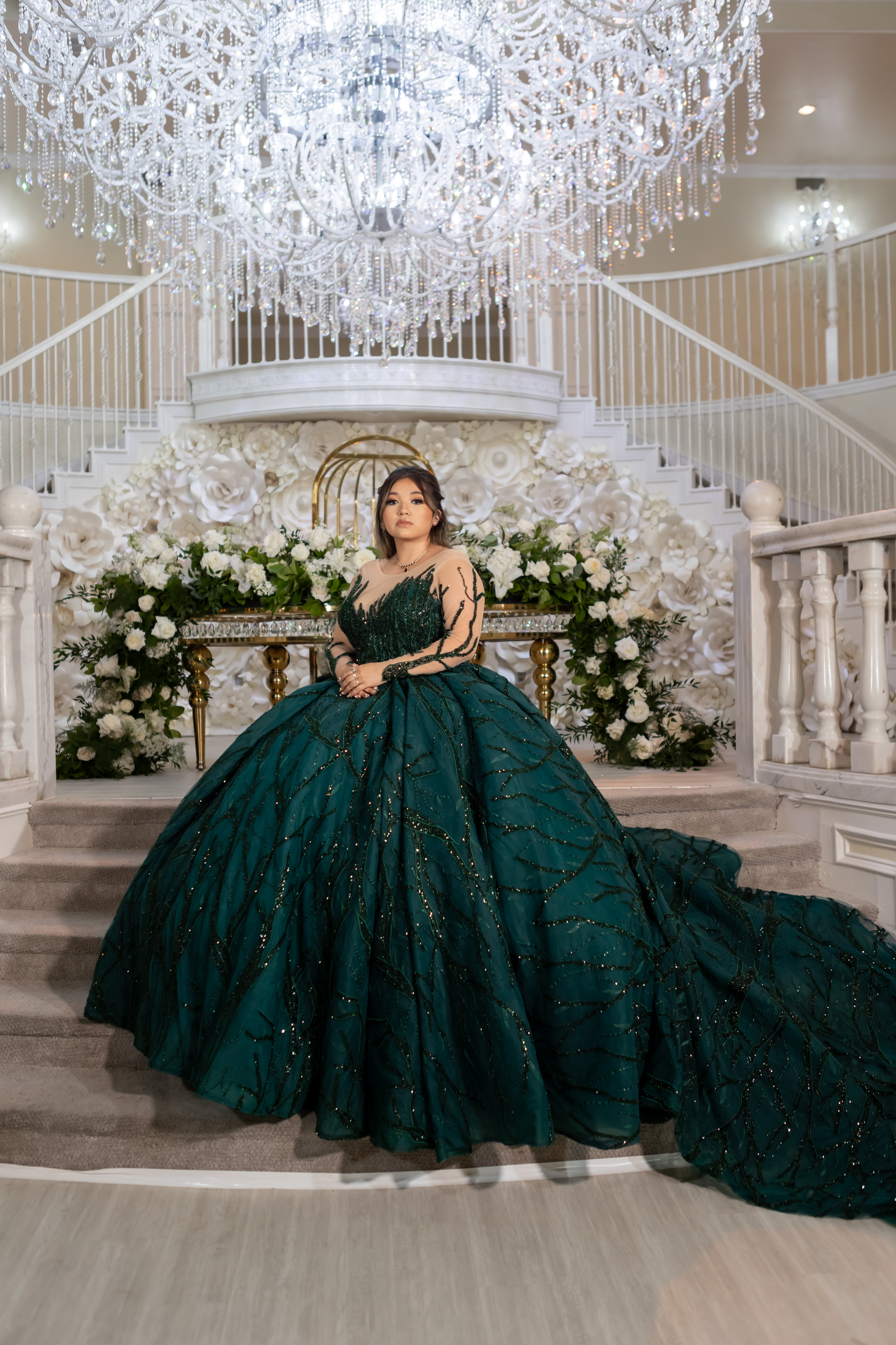 Emerald and black quinceañera with gold accents